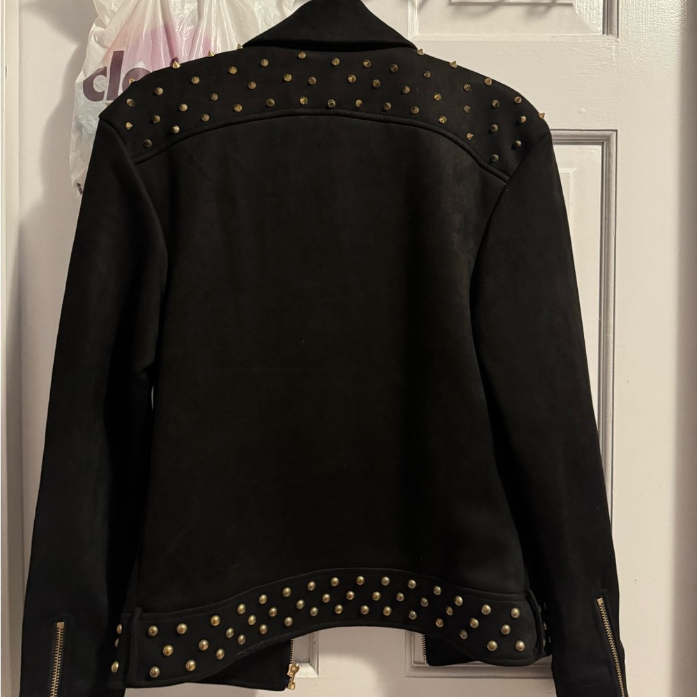 Velour, black jacket with stud detailing on the shoulders and around the back